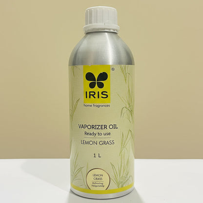 Vaporizer oil bottle with lemon grass scent on a beige background